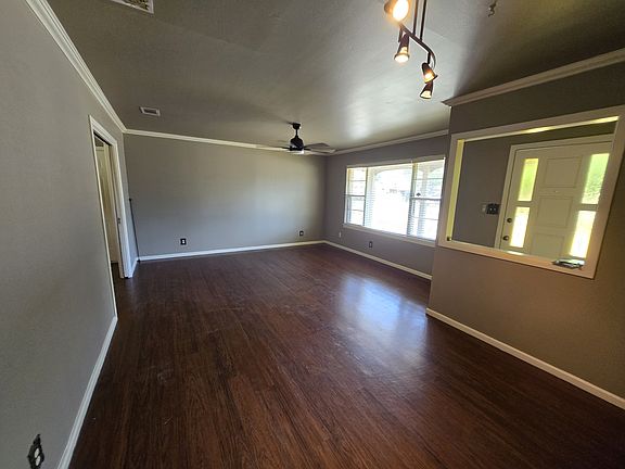 Looking across the great room. 95" TV easily fits the huge 12' wall.