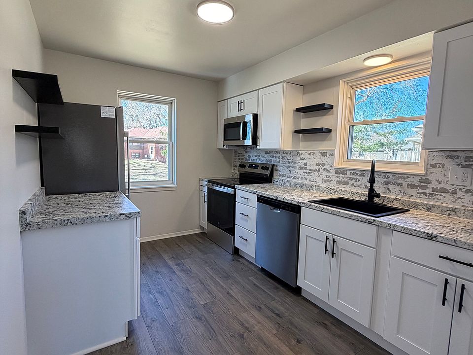 1st image of 5711 NW Hillside Dr #5711