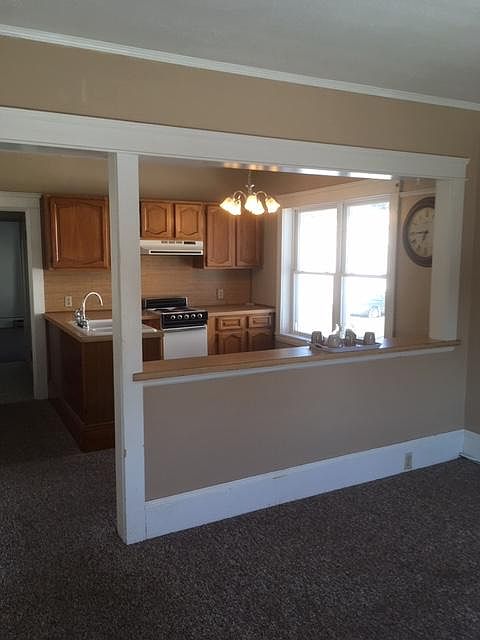 The kitchen is open to the living room. There is enough room for a small table in the kitchen area.