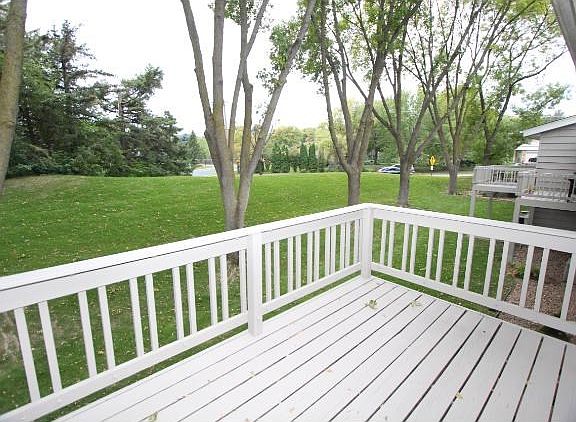 Walk out to the upper level deck from the informal dining area.