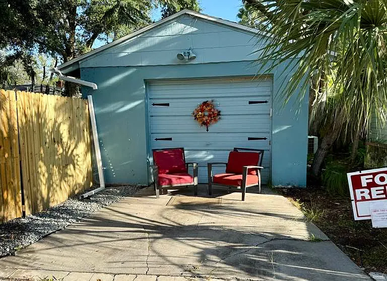 Alley entry/ parking. Garage door is not functional, drywall on the other side.