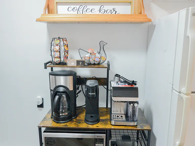Coffee drip, cappuccino, K-cup coffee machines. Wine and champagne glasses