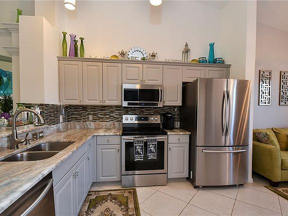 Large all renovated kitchen with stainless steel appliances.