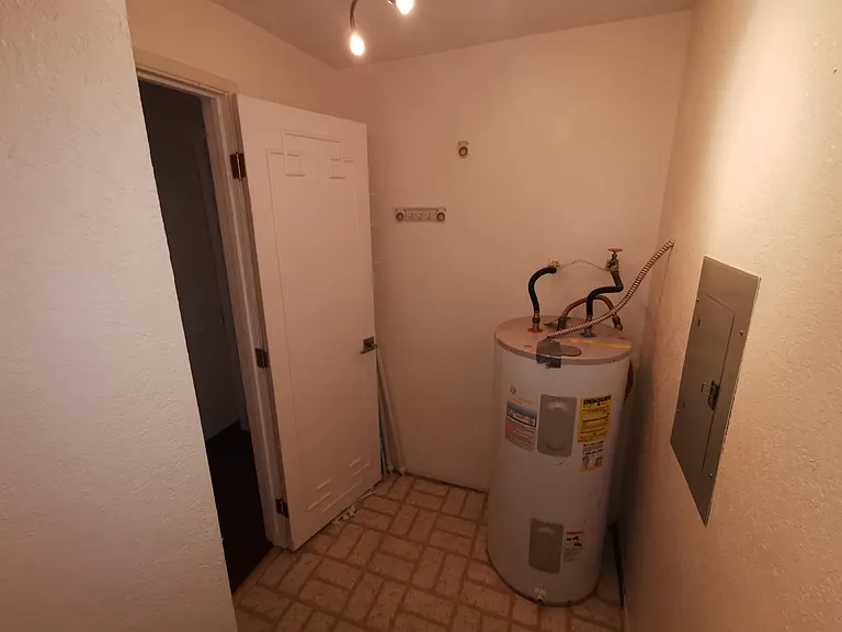 Other angle of 3rd room storage room.