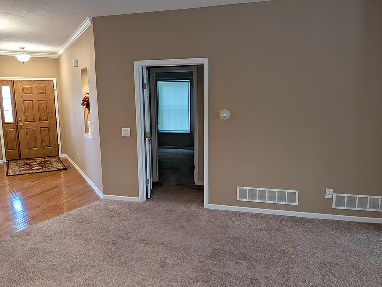 Entry to second bedroom, hall, and bathroom