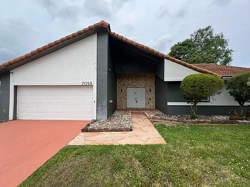 7099 NW 48th Ct Photo 1
