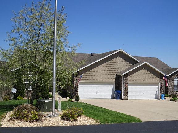 Landscaped Front with Wide 2-Car Drive