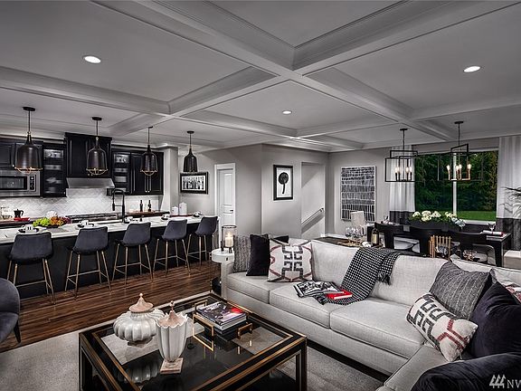 Home site 4 is a presale, photo shown of the model home which includes upgrades, including expanded island.