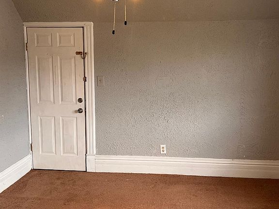 Entrance into apartment to living room