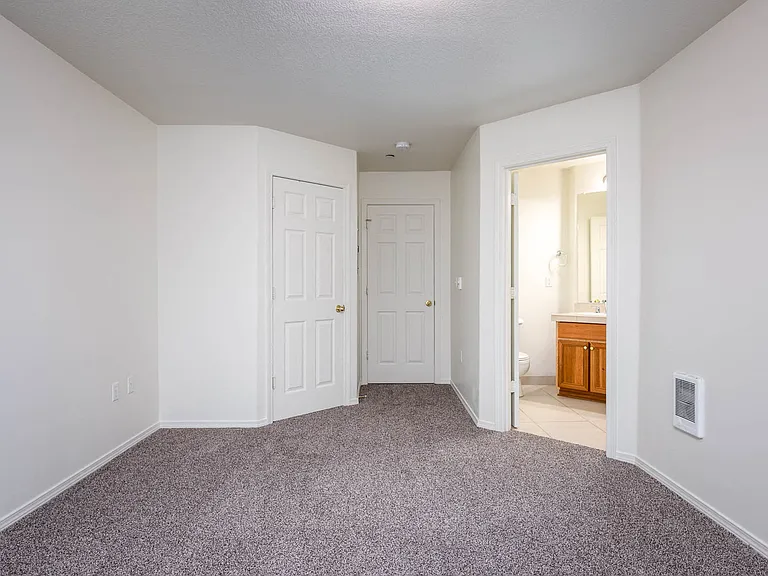 Village at Main Street | 2x2 Bedroom One Closet and Bathroom Entrance