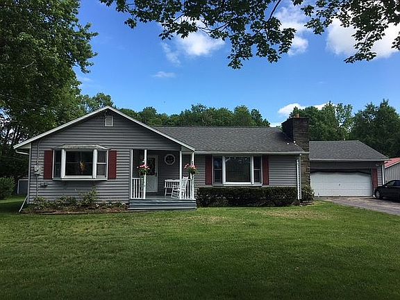 Front View with 2 car garage