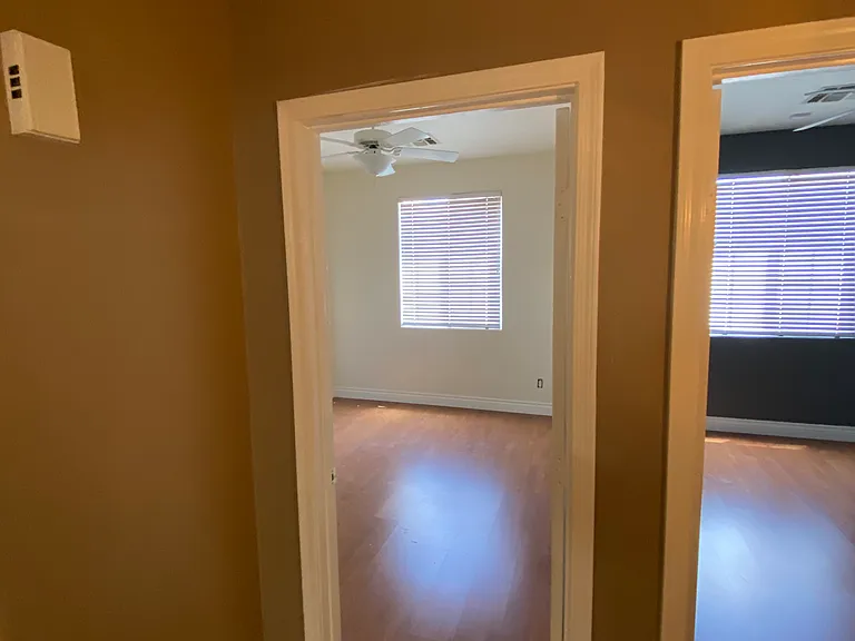 Hallway view of guest bedroom #1.