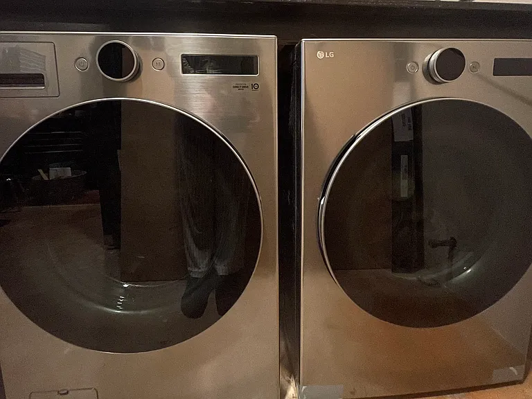 New LG Washer Dryer. Updated Laundry and Storage room.