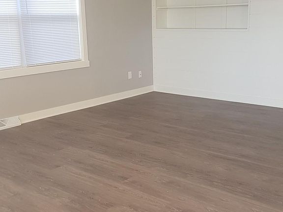 Updated Living room with LVT flooring and Shiplap accent wall
