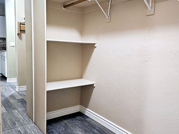 The suite has a walk-in closet.