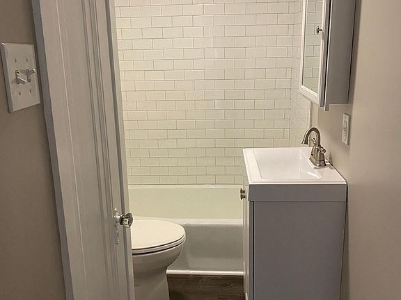 Completely renovated bath with subway tile shower. Nice!