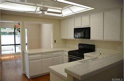 Spacious open kitchen with tons of cabinet space and counters fo