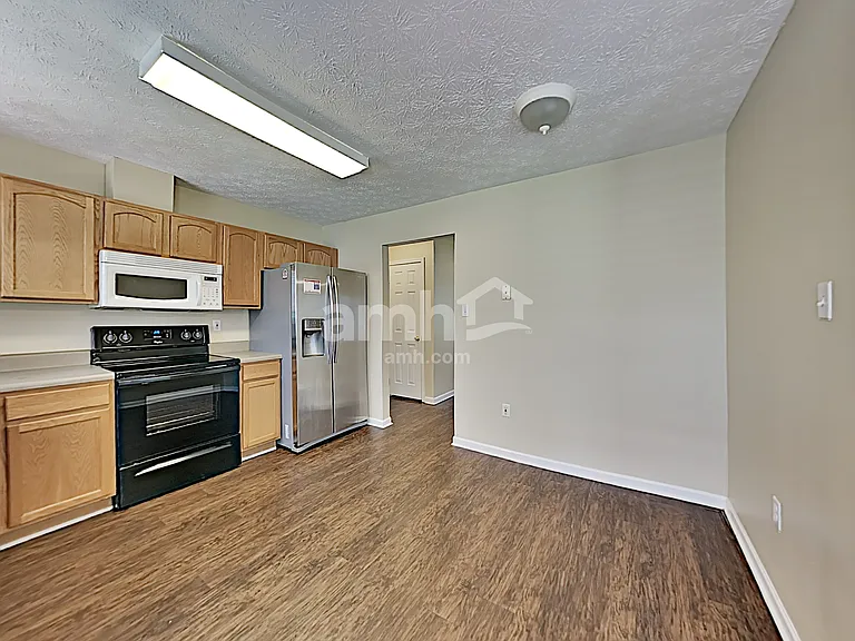 7718 Edith Keeler Ln — Photo 3