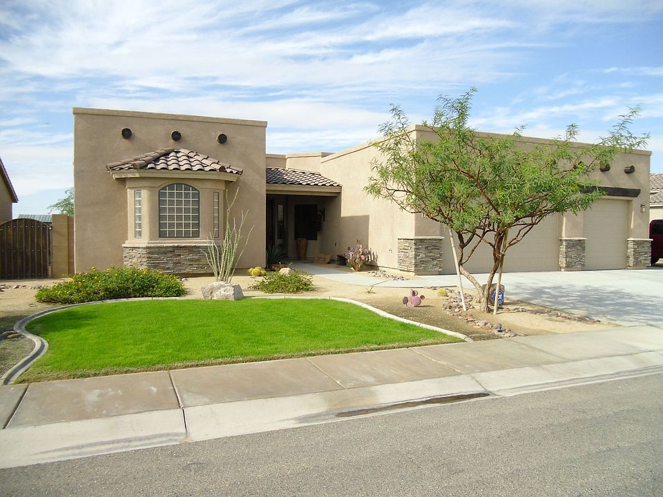 stone facing front and rear of home