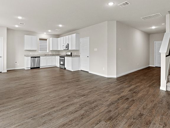 Family Room to Kitchen and Dining Area