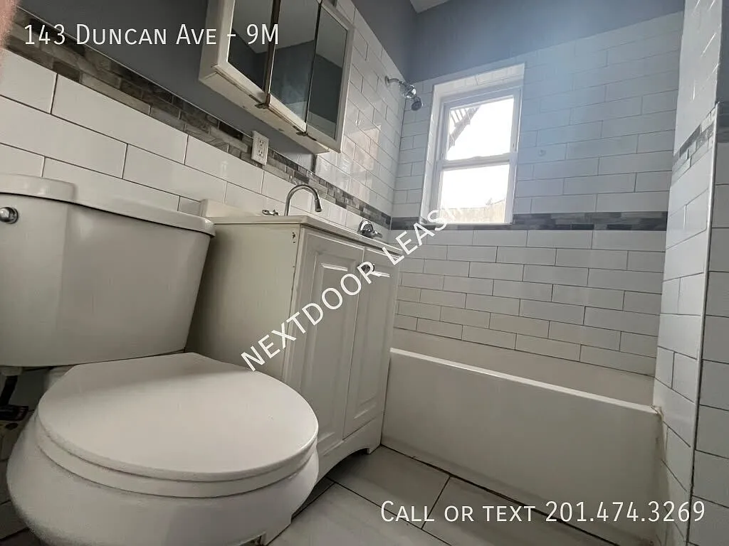 143 Duncan Ave — Photo 4