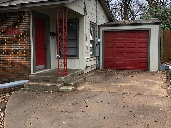 Driveway, garage and front porch.
