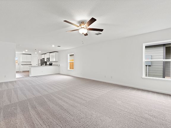 An open layout allows for fluid movement from room to room.