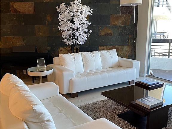 5th image of 3500 Mystic Pointe Dr APT 2607