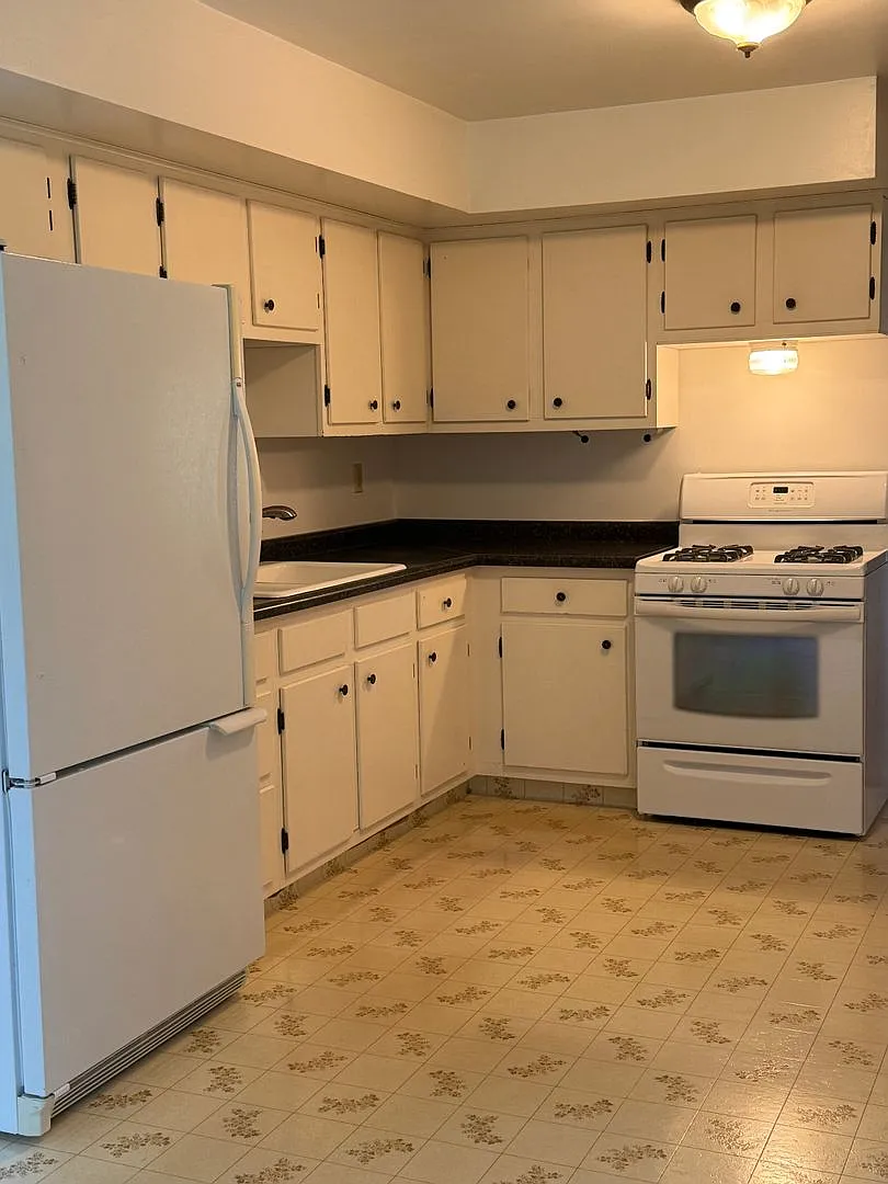 Check out this Charming 3-Bedroom, 1-Bathroom Home with Spacious Backyard — Photo 3