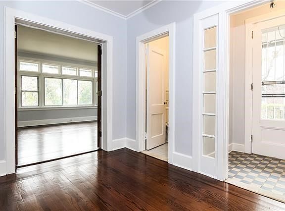 Main entrance with large living room and powder room.