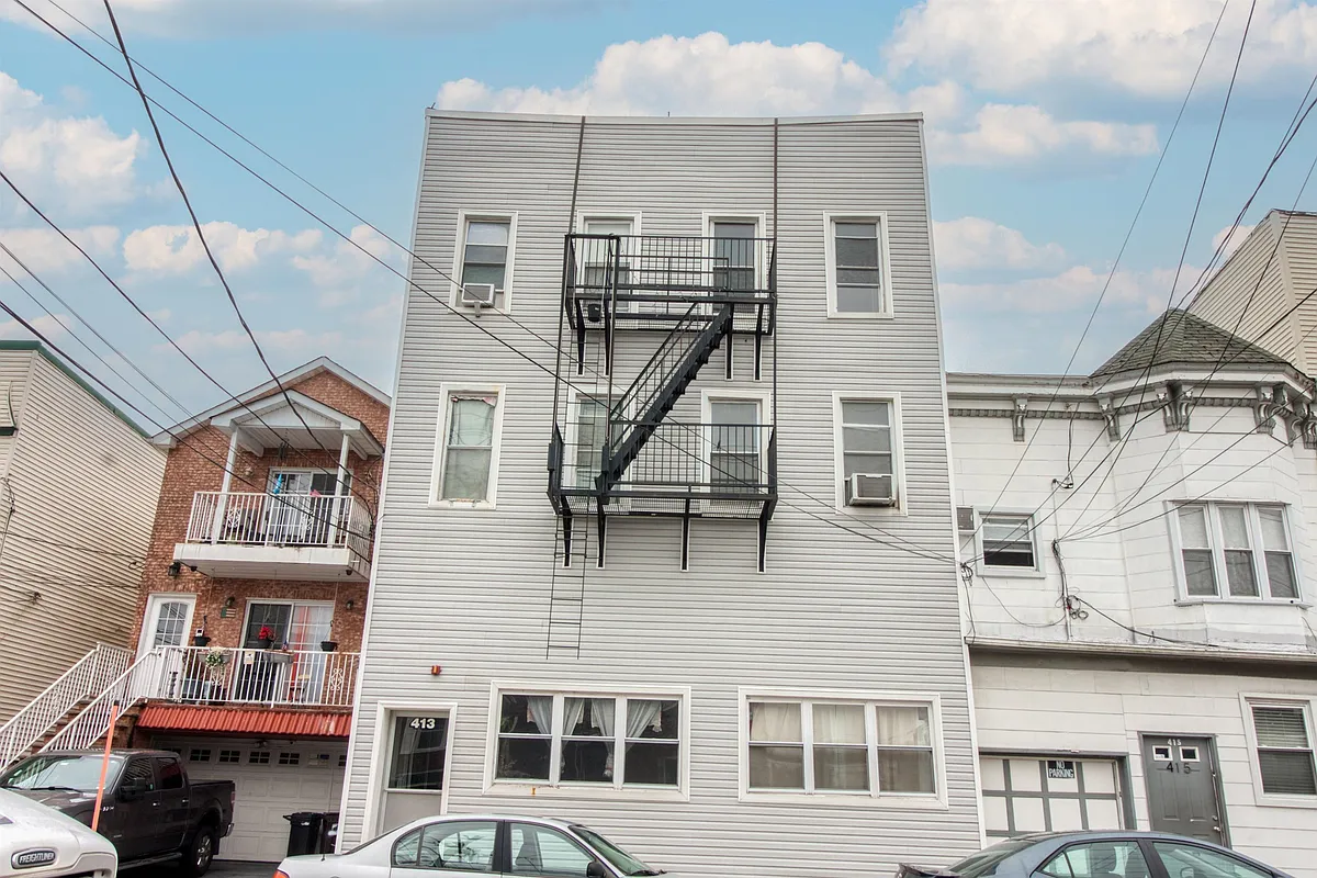 Building Photo - 413 70th St #5