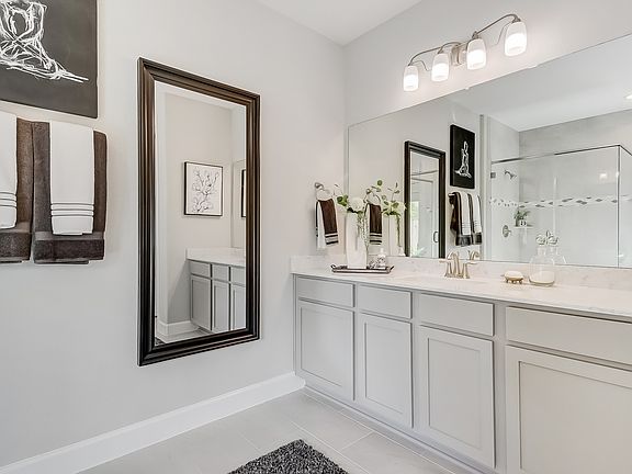 Ample cabinet space in owner s bath