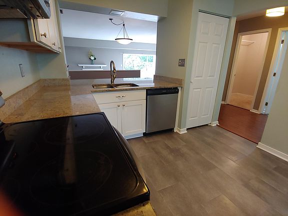 Kitchen view into dinning and living room