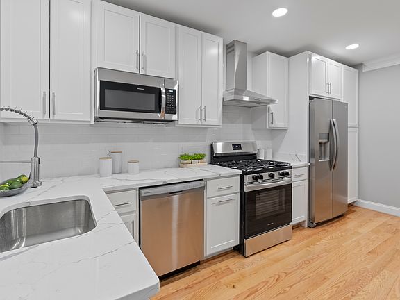 Kitchen (3) All Brand New Appliances with half bathroom on main floor.
