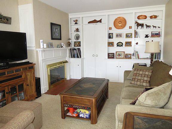 Den toward fireplace