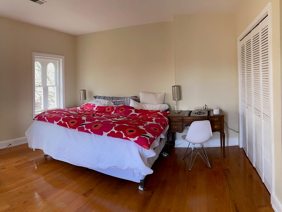 Spacious South Facing Bedroom with wood floors