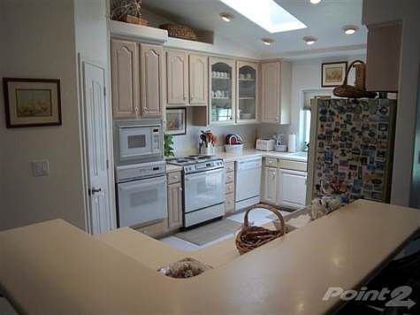 Food preparation is made easy with this great kitchen.