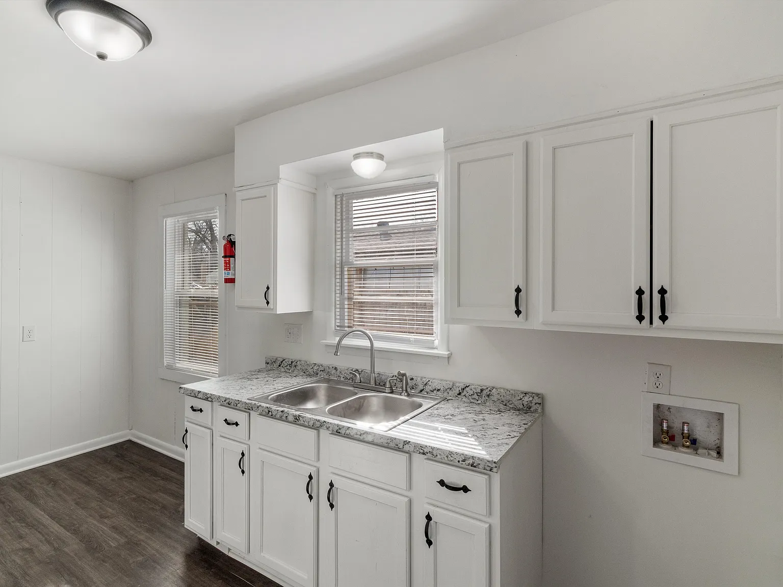 Freshly Updated 4BR White Brick Home with Carport & Fenced Yard — Photo 4