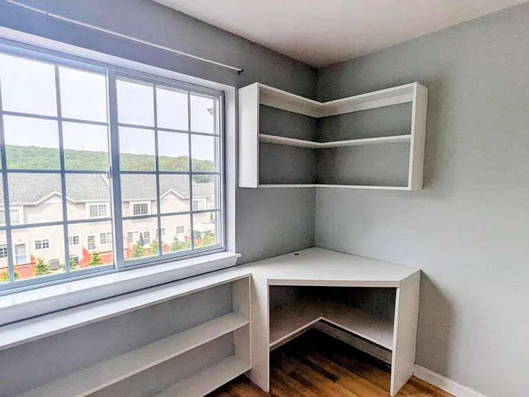 Bedroom 2 (with built-in bookshelf and a built-in desk)