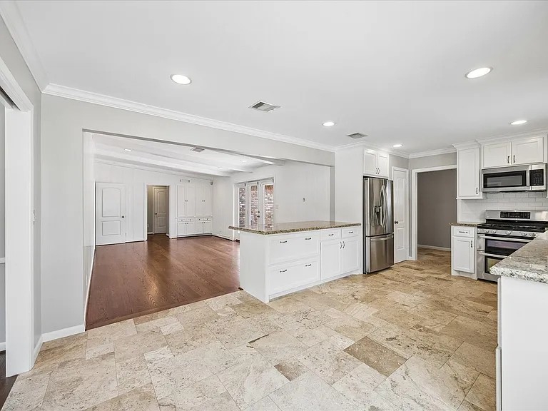 9310 Woodmeadow St — Photo 10