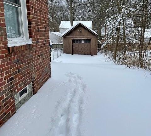 Long driveway for lots of parking and garage with garage door opener remotes (x2)
