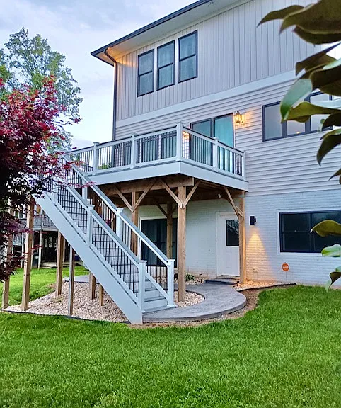 back of house and deck connected to kitchen/family room