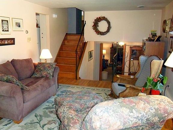 Here is another view of the living room looking toward the steps and the entry hall.