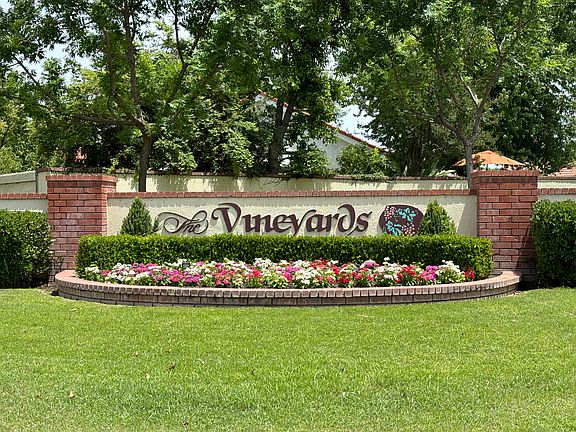 Located in "The Vineyards" community with private pools, tennis & pickleball courts and park area with BBQ's