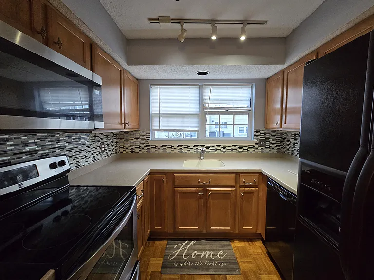 12110 Green Leaf Ct #202 — Photo 7