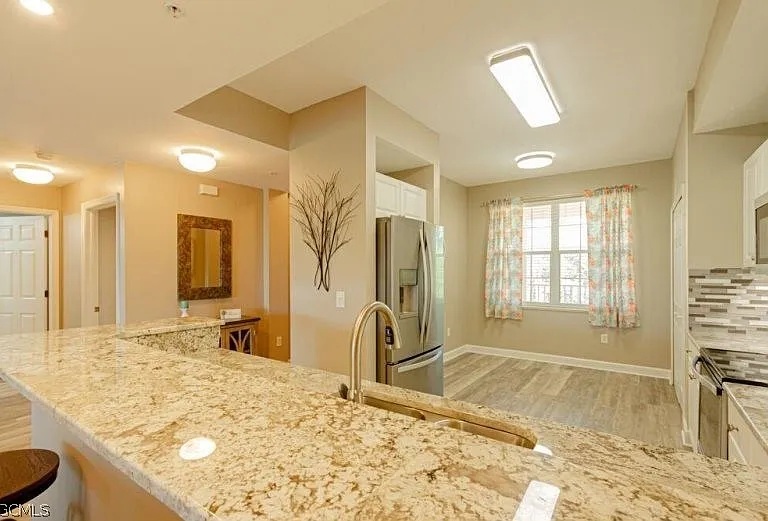 10700 Ravenna Way #303 — Photo 8