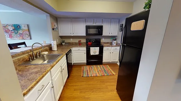 Black on Black Appliances and Plenty of Counter Space Black on Black Appliances and Plenty of Counter Space