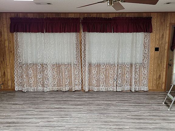 Huge Den with 3 large window