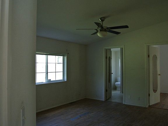 This is the Master Bedroom.  It has its own bath.  The door on the right goes to the Home Office which can be entered from the kitchen.  