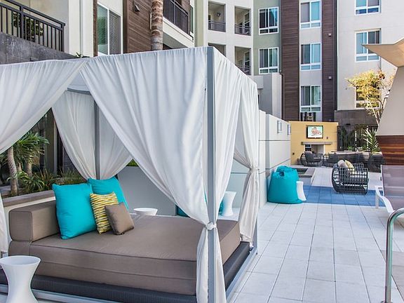 Covered Pool Side Lounge ; Elan Huntington Beach ; Luxury Apartments Huntington Beach CA